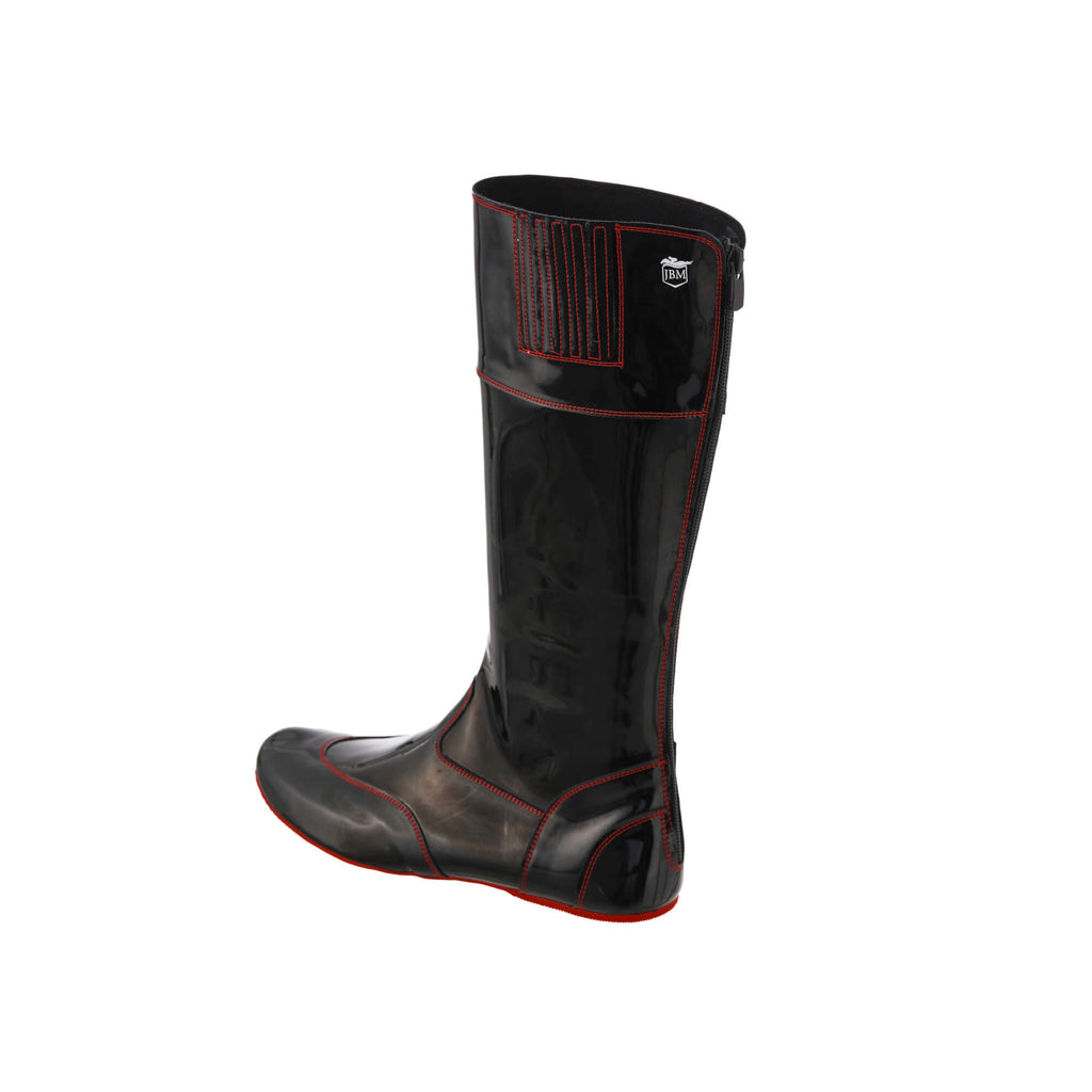A single tall racing boot made of black material with red exterior stitching and red soles, displayed against a white background. The boot features a back zip and a 1.5-2cm stretch feature around the calf. This image only showcases the boot from a side-back perspective.