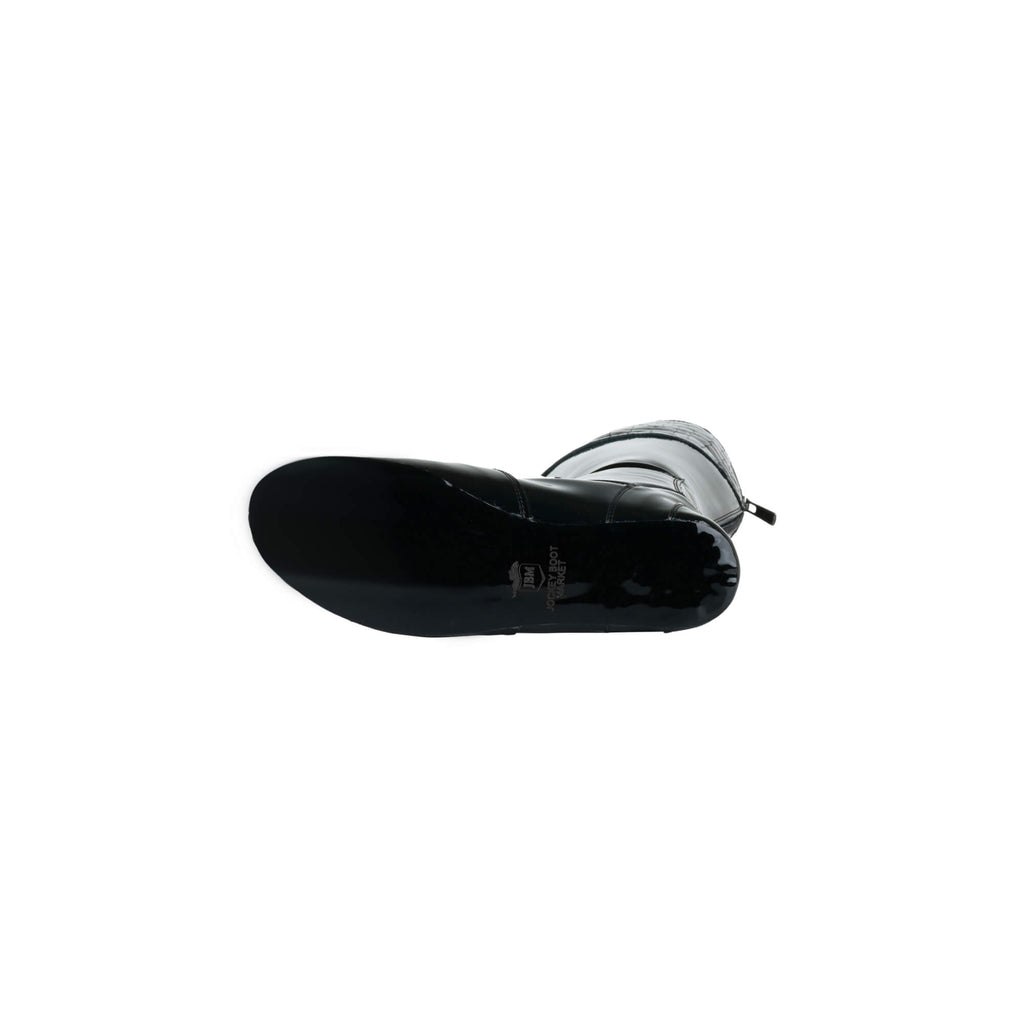 A single tall racing boot laid down to showcase the sole, displayed against a white background. The boot is made of black material with black crocodile accent around the calf area. It features a back zip and a 1.5-2cm stretch feature around the calf.