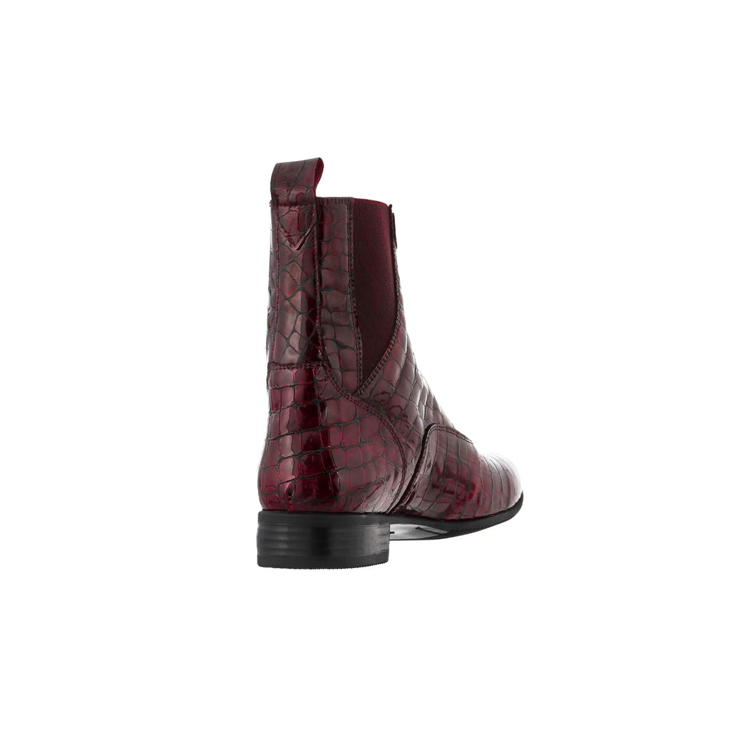 A back view of a burgundy crocodile boot, displayed against a white background.