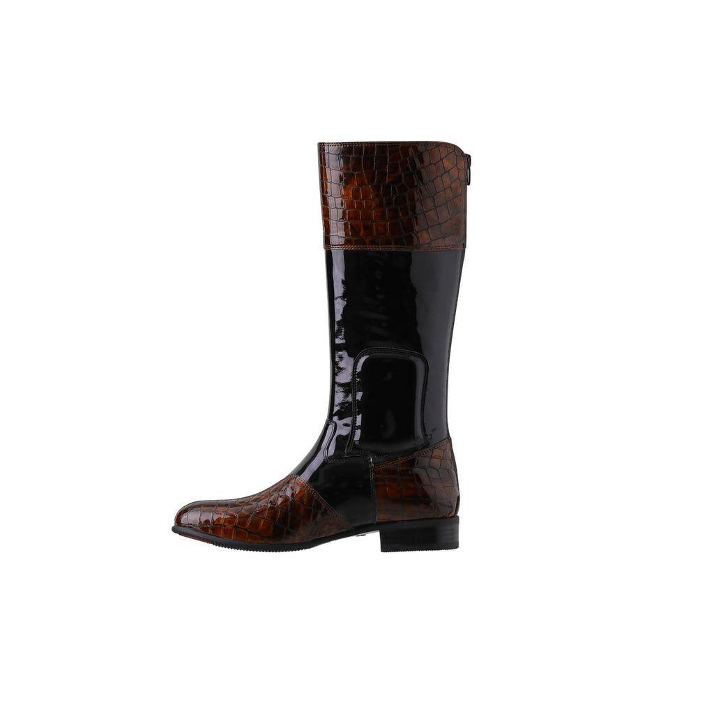 A single tall boot displayed against a white background. The boot features black patent leather with brown crocodile accents. It has a back zip and a 1.5-2cm stretch feature on the calf area. The image showcases the boot from a side perspective.