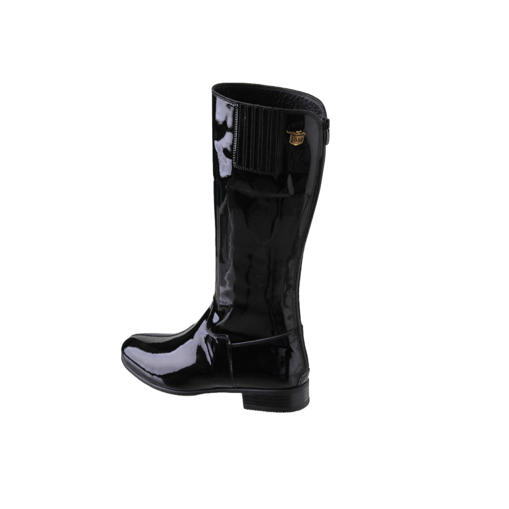 A single tall black patent leather boot displayed against a white background, featuring a back zip and a 1.5-2cm stretch feature on the calf area, shown from a side-back perspective.